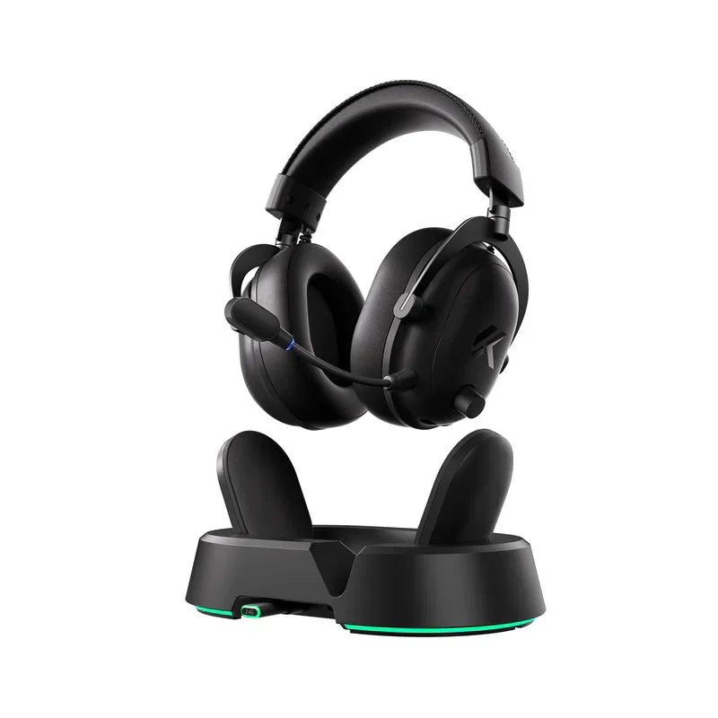 Wireless gaming headset with mic on charging dock, green LED glow, sleek black design for PC setup