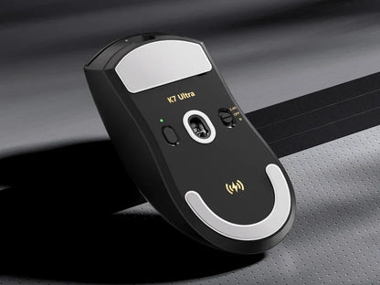 K7 Ultra wireless gaming mouse with 2.4G connectivity, sleek black and silver design for PC gamers