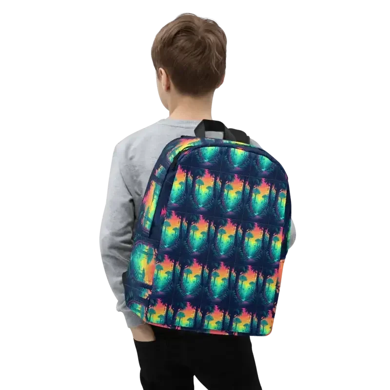 Boy wearing backpack with colorful palm tree pattern on a dark background