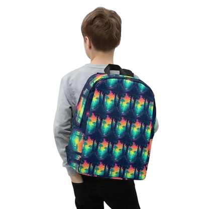 Boy wearing backpack with colorful palm tree pattern on a dark background