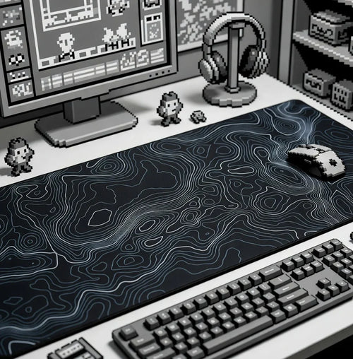 Retro 8-bit gaming desk setup with contour mouse pad, keyboard, mouse, and headset